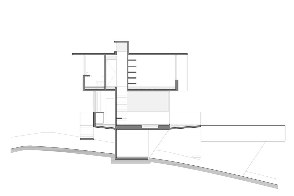 Luciano Kruk's concrete holiday home floats on a plinth and connects swimming pool with terrace