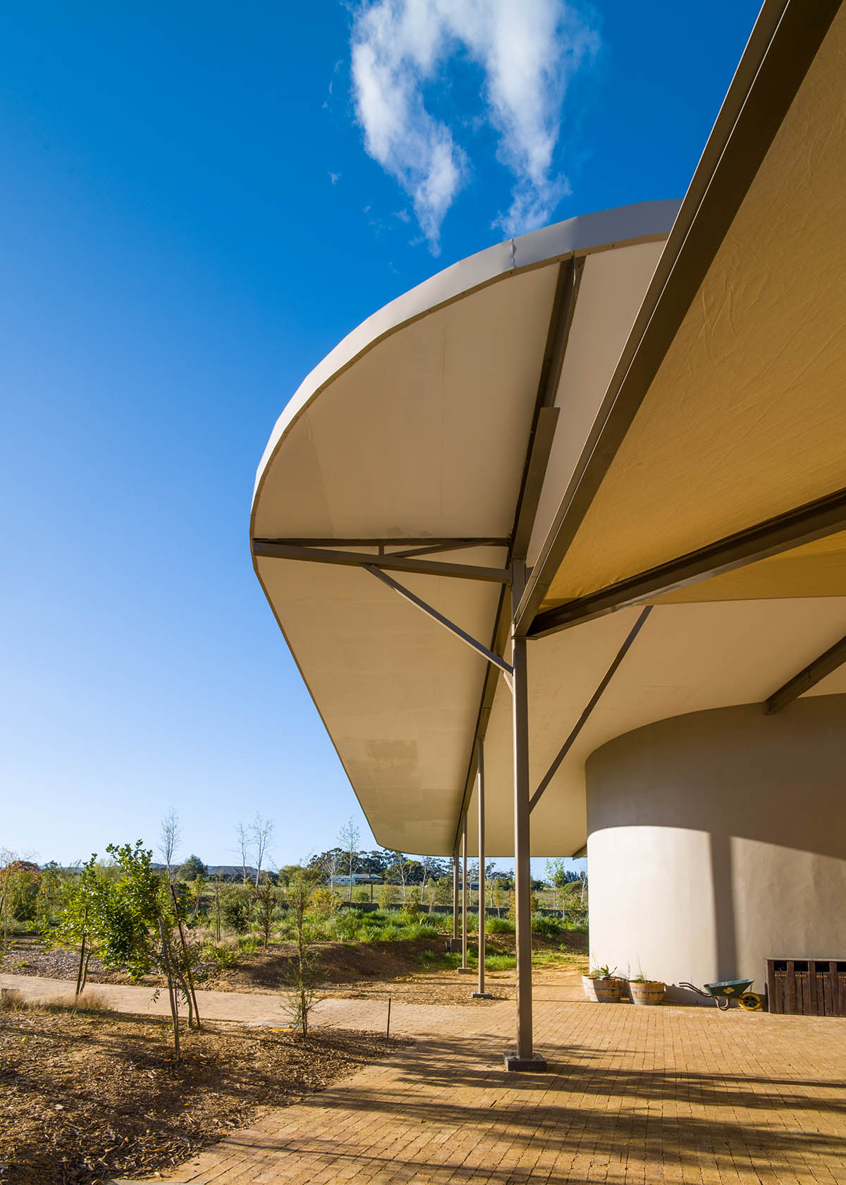 GASS Architecture Studios built green school with rounded walls and leaf-like roofs in South Africa 