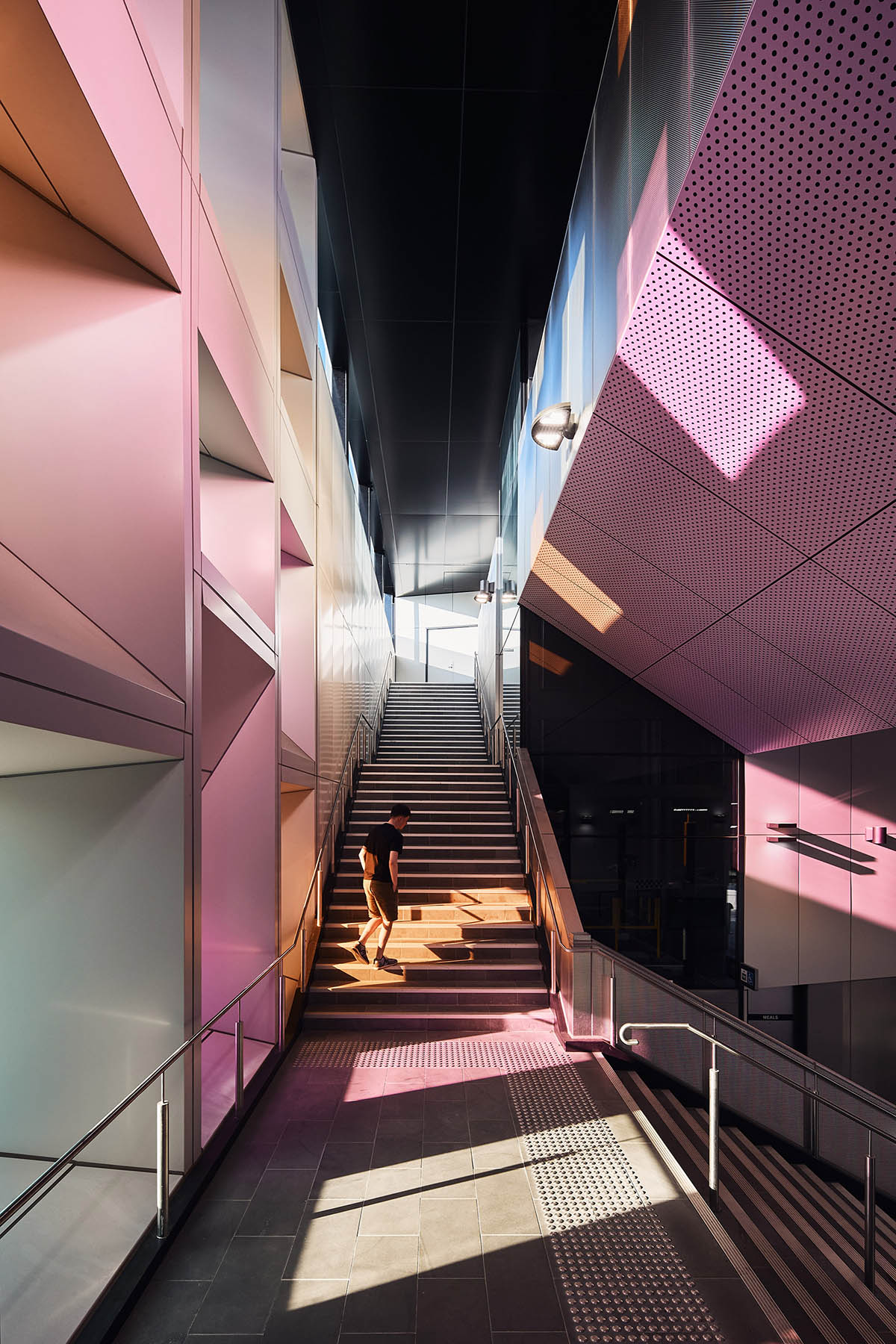Wood Marsh abstracts Darebin’s roofscape into a 3D concrete pattern for Bell and Preston Stations