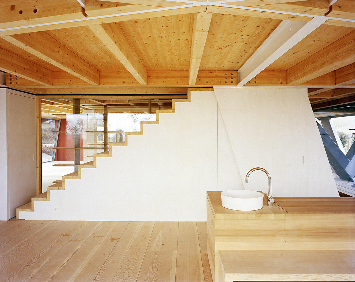 Dieter Dietz completes birdhouse-looking living space nestled in the Swiss rural landscape