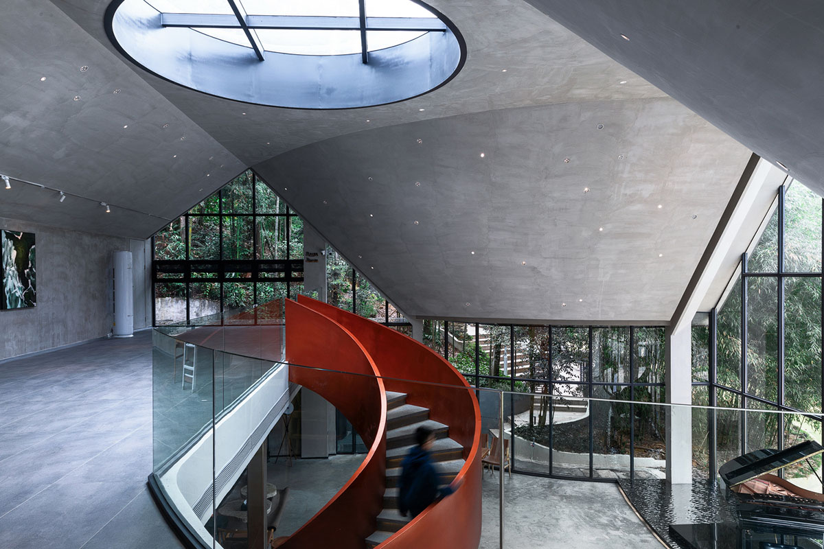 Wildurban Architects completes restaurant with cave-like roof in a forest in Huizhou, China