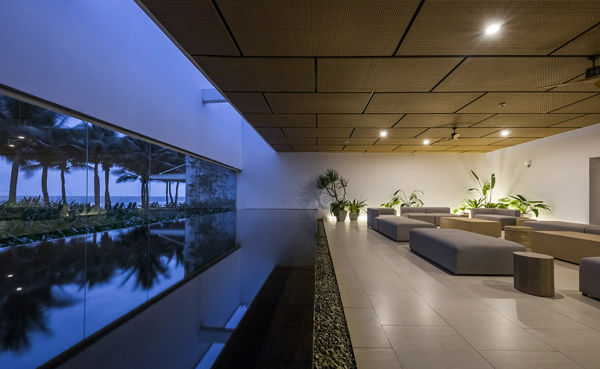 Six landscape boxes form this gallery and showroom by MIA Design Studio in Vietnam