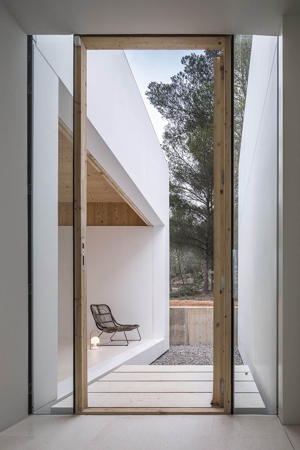 Marià Castelló Architecture designs fragmented all-white family house on the island of Ibiza