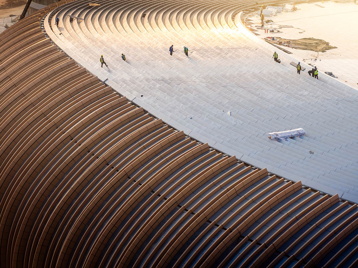 ZHA's Greater Bay Area Sports Centre, featuring distinctive layered roof, nears completion in China