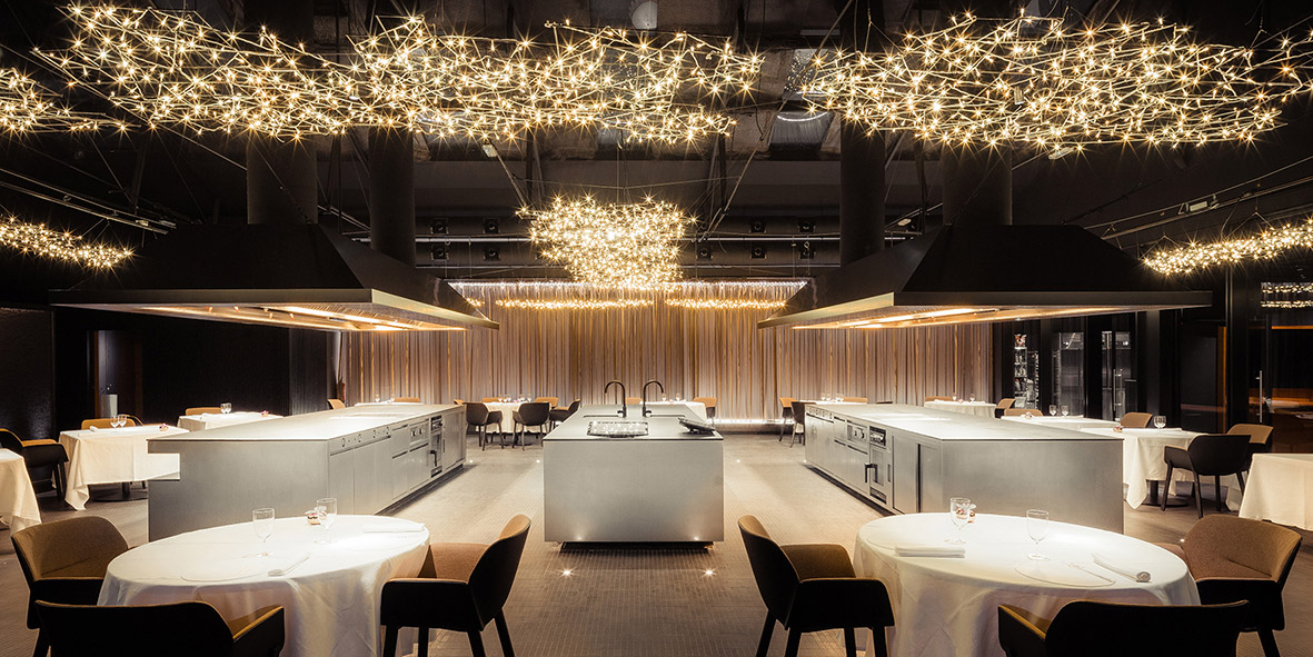 OAB transforms an old industrial warehouse into a kitchen and restaurant in Barcelona