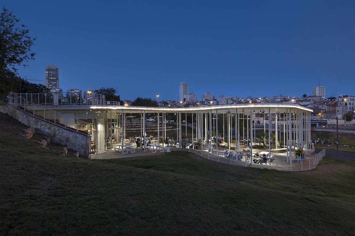 Yaniv Pardo Architects designs open coffee shop with slim columns in idyllic landscape of Jerusalem