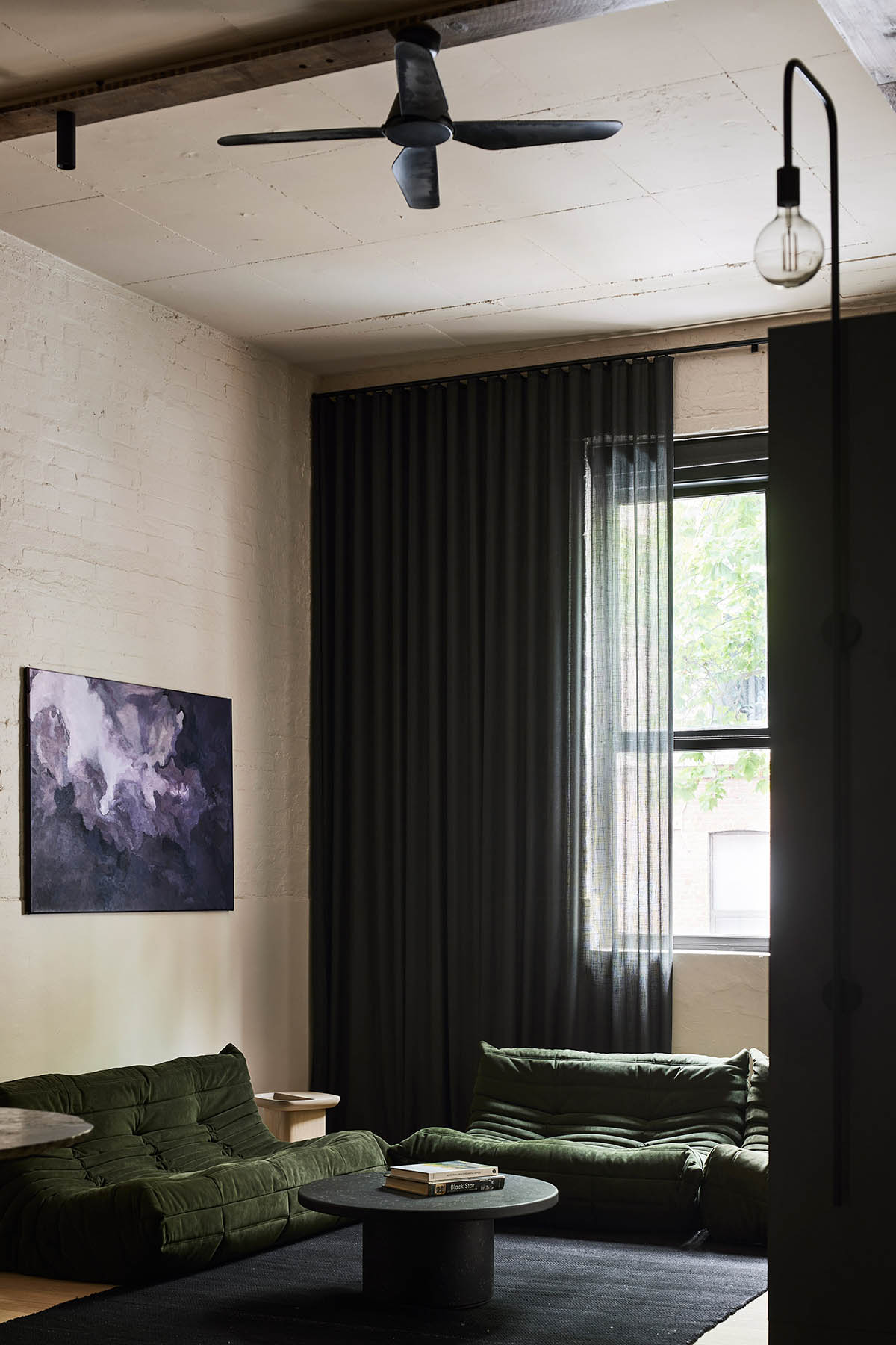 Splinter Society transforms former chocolate factory warehouse flat with earthy and rustic tones