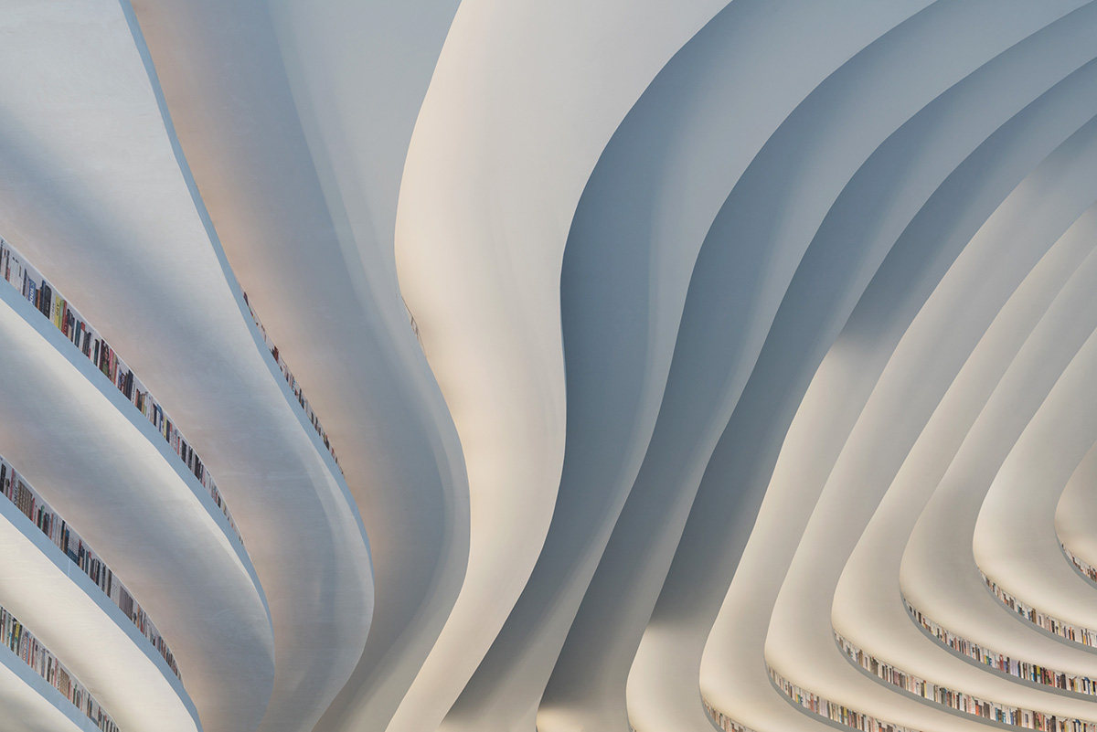 MVRDV’s topographical Tianjin Binhai Public Library featuring millions of books opens in China