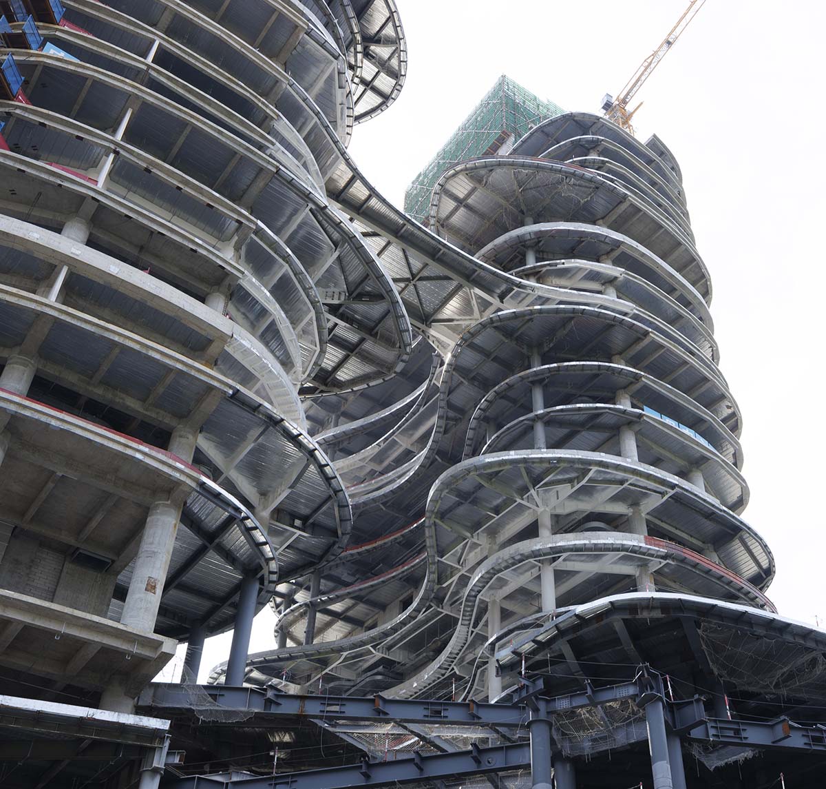 Zaha Hadid Architect's striated Yidan Center reaches its maximum height in Shenzhen 