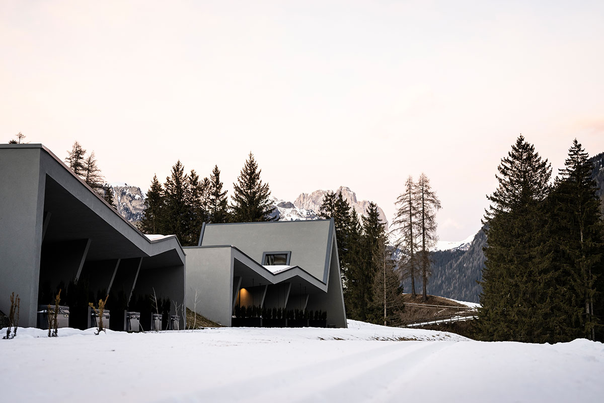 Zigzag roof defines character of Olympic Spa Hotel by NOA in the Alpine meadow