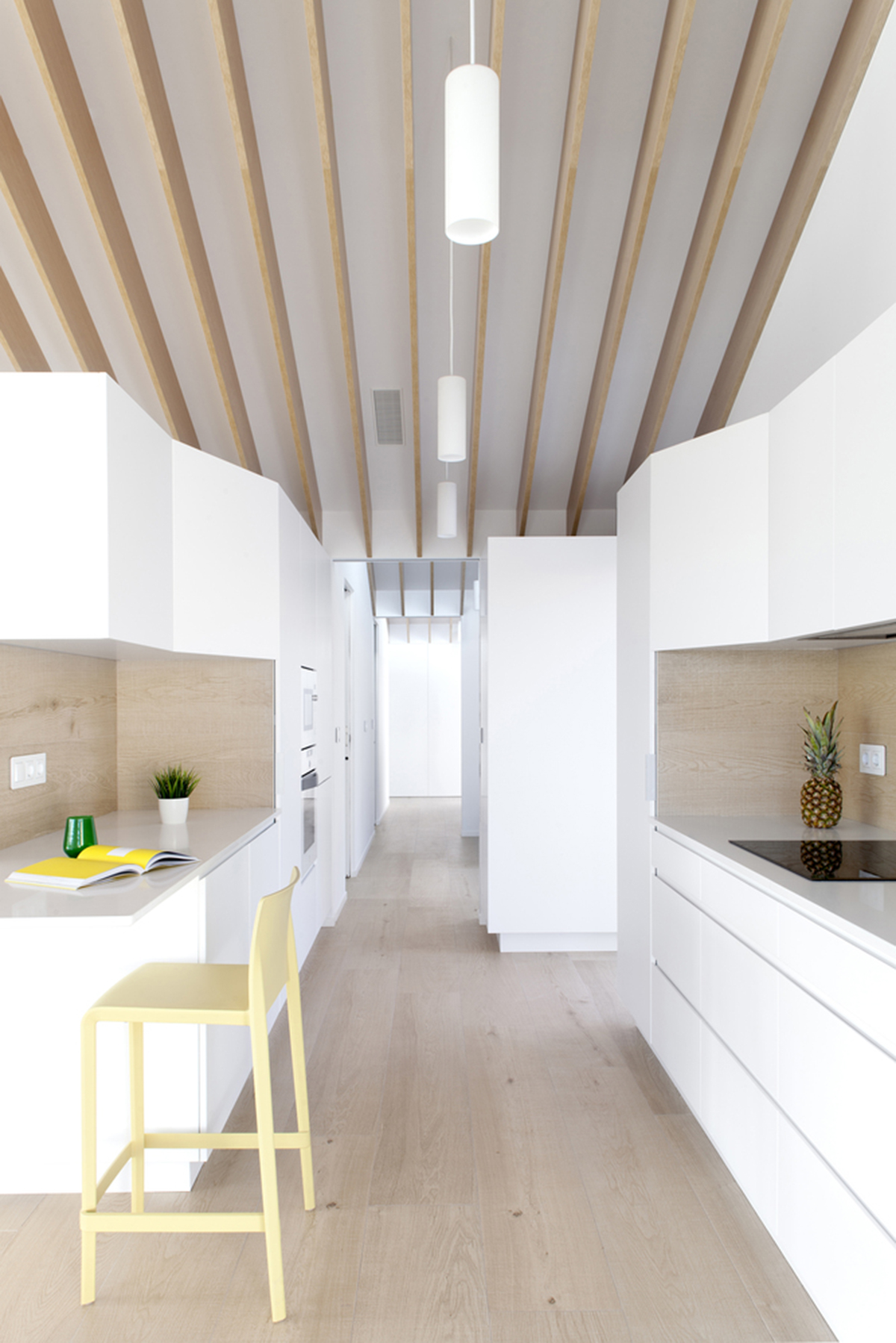 Pablo Muñoz Payá Arquitectos renovates former house with wooden shutters in Spain