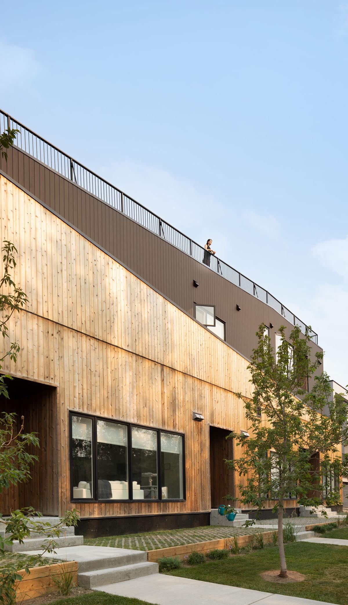 Multi-residential housing by MODA features a barrier-free rooftop urban farm in Calgary