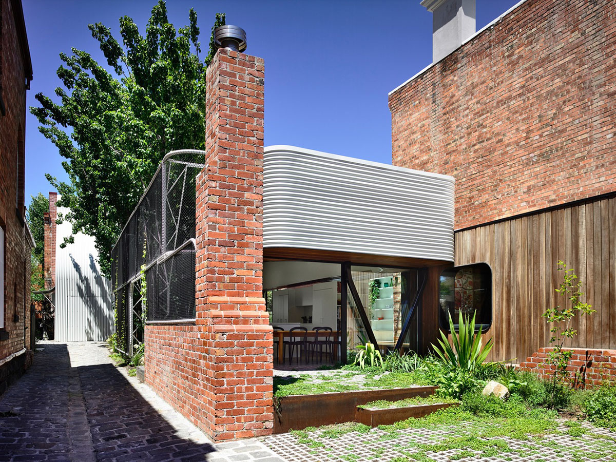 Austin Maynard Architects extends existing terraced home with corrugated steel pavilion