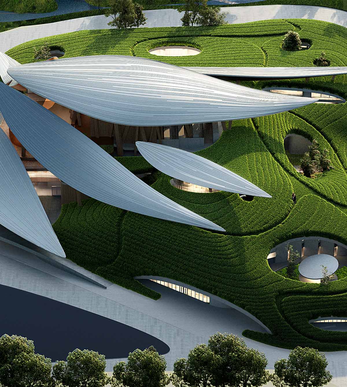 MAD hides culture and arts center beneath metal roofs scattered like 