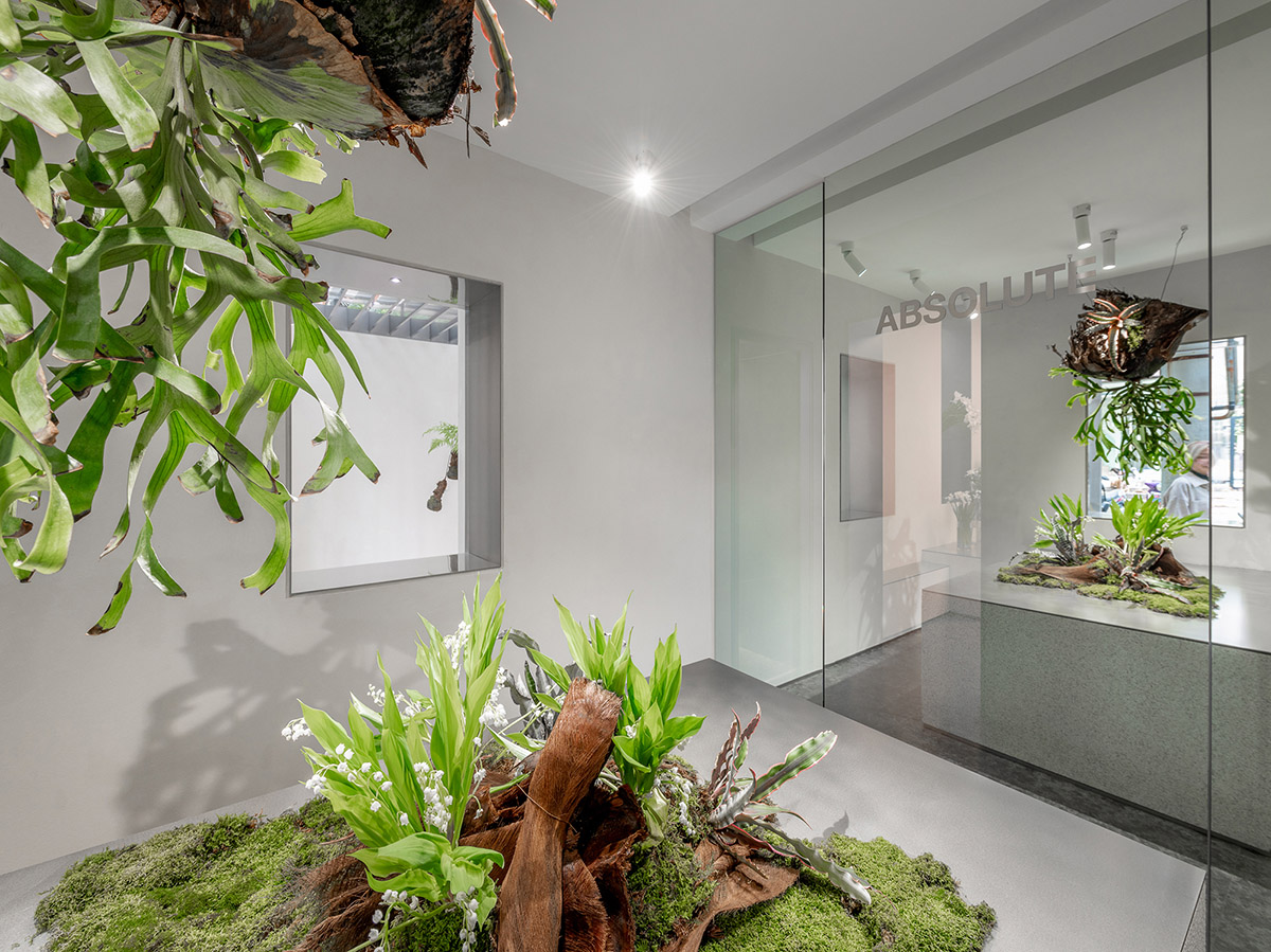 More Design Office's Absolute Flower Shop features cellular spaces with flower arrangements