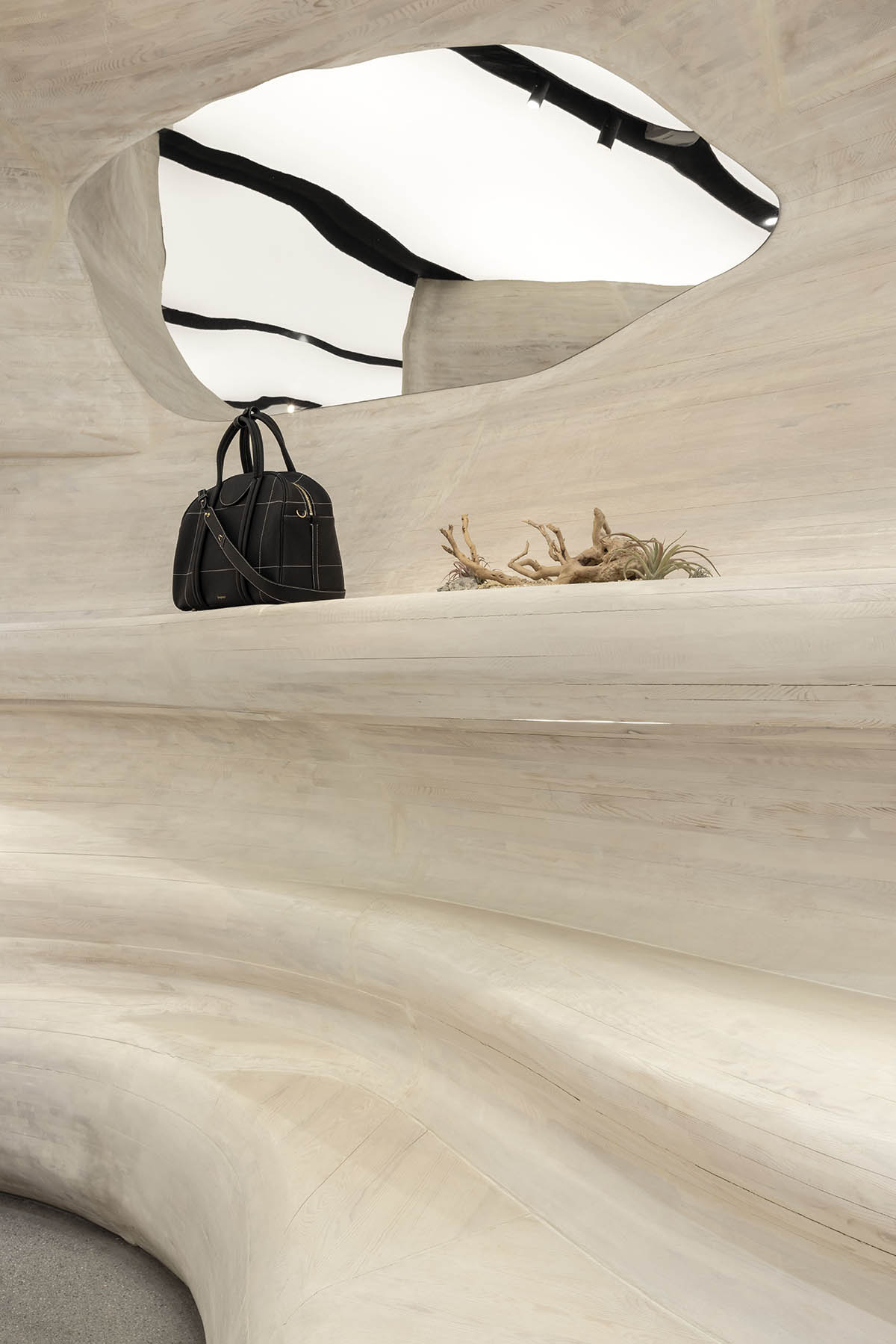 Interiors of Songmont Huaihai Road Store mimic wind-sculpted canyons in Shanghai