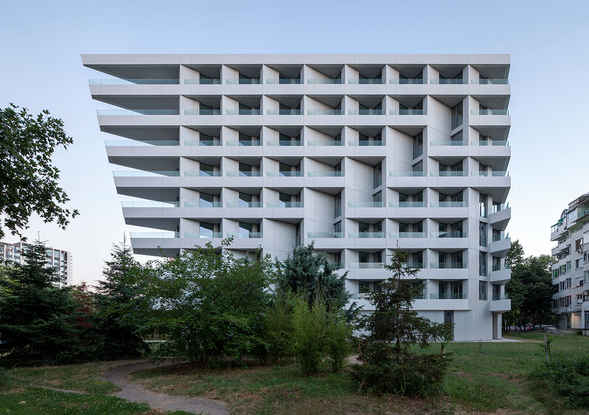 Sharp triangular balconies define this residential block designed by STARH in Bulgaria