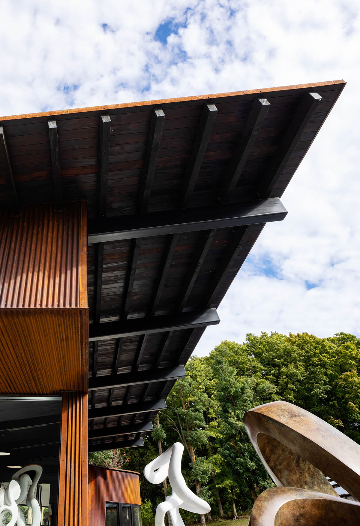 Corten steel artist's studio by Birdseye is enriched by light-filled interior on a valley of Vermont