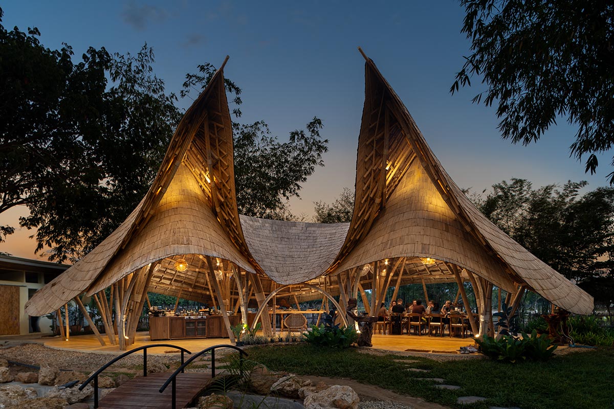 Chiangmai Life Architects creates fluid bamboo domes for a cooking school in Thailand