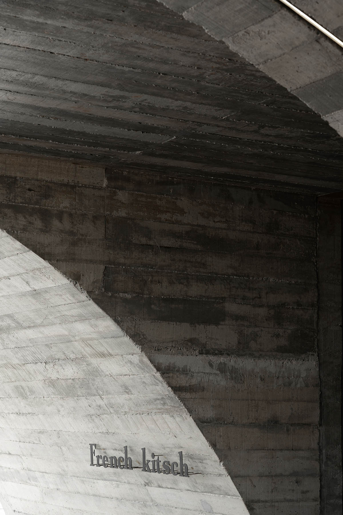 French Kitsch III is a cathedral-like cafe in Thailand that features imperfect arches