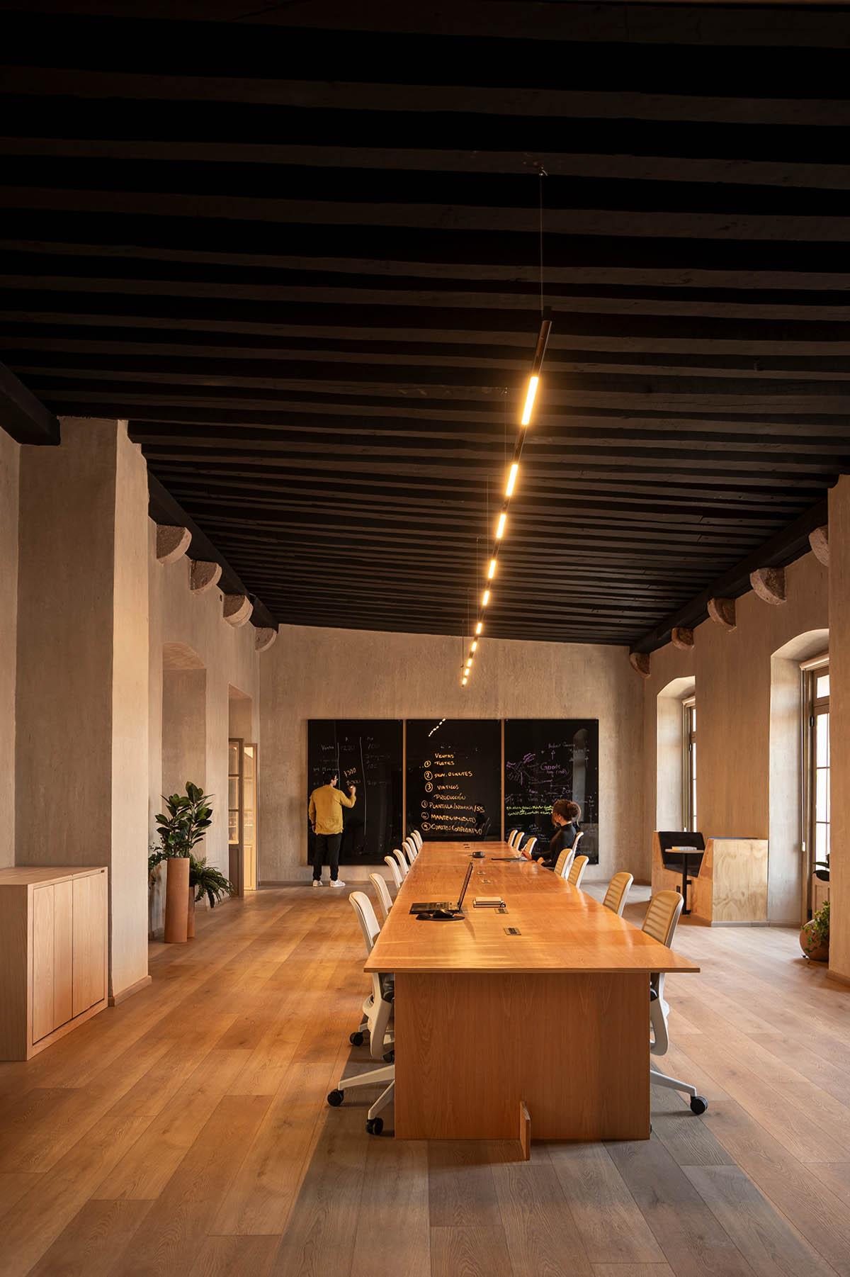 FMA. designs corporate building with warm, earthy tones in a former 17th-century convent