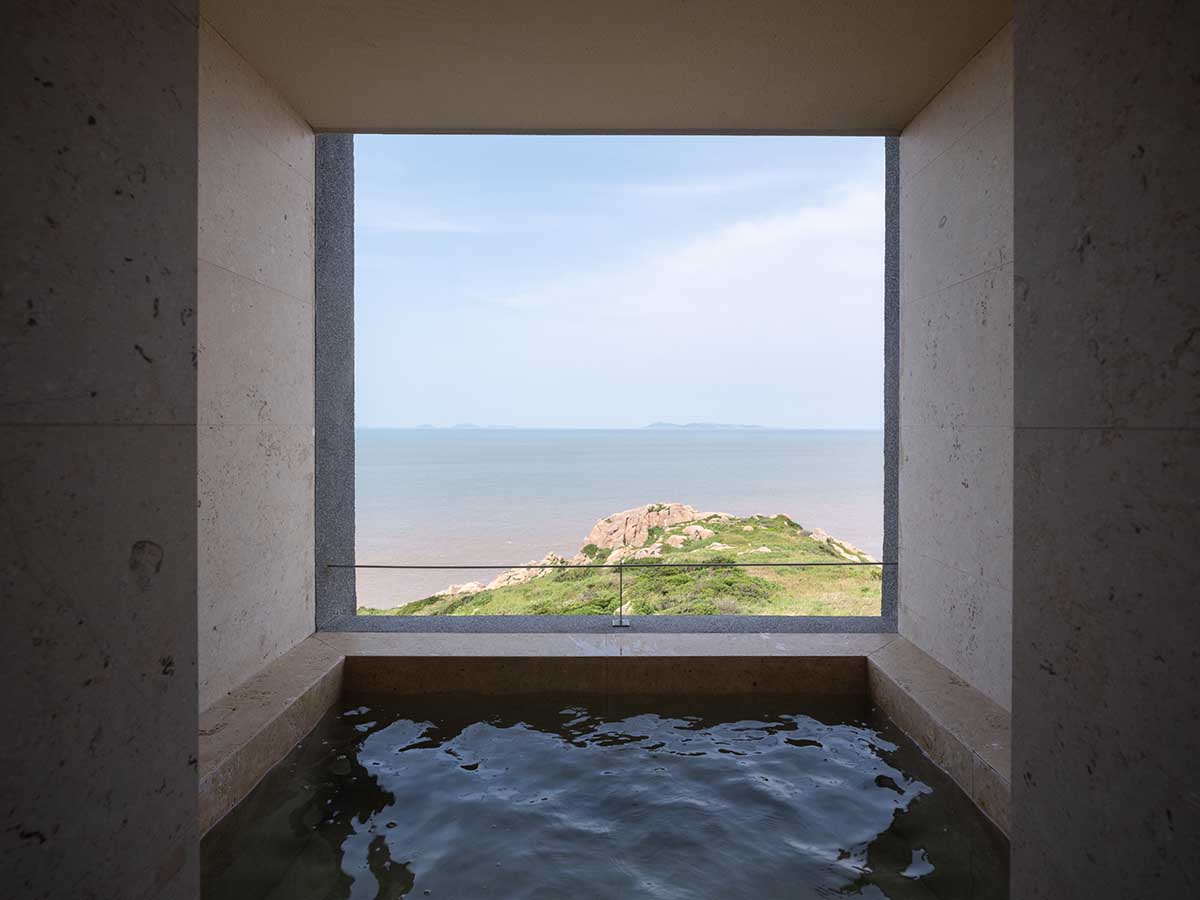 The Lighthouse Hotel reinterprets traditional fishing village settlements on a steep reef in Zhoushan