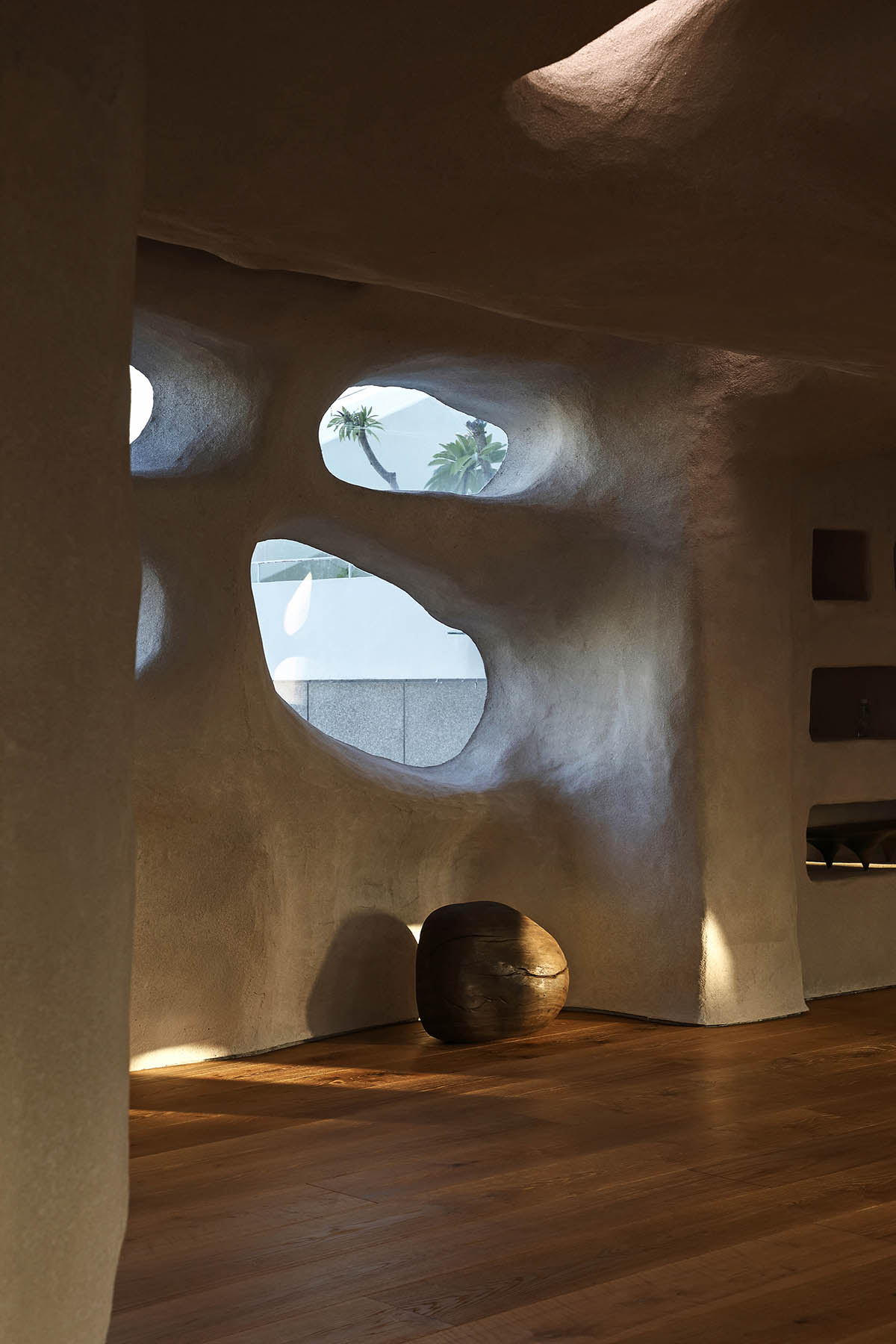 Pilates studio by Wanmu Shazi creates cave-like experience with amorphous interiors in Xiamen