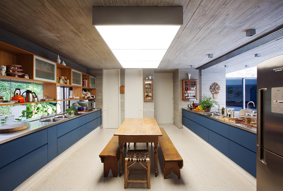 Perkins+Will's Cidade Jardim House features a large garden space under thin columns