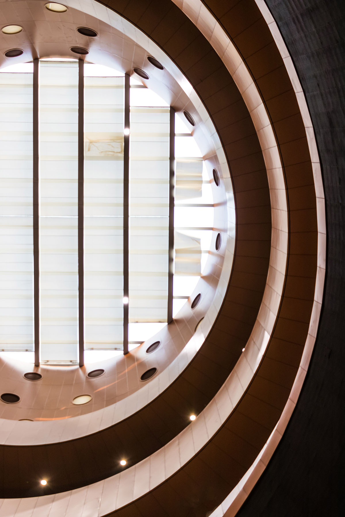 Bernard Tschumi's Exploratorium features copper-clad cones addressing Tianjin's industrial past