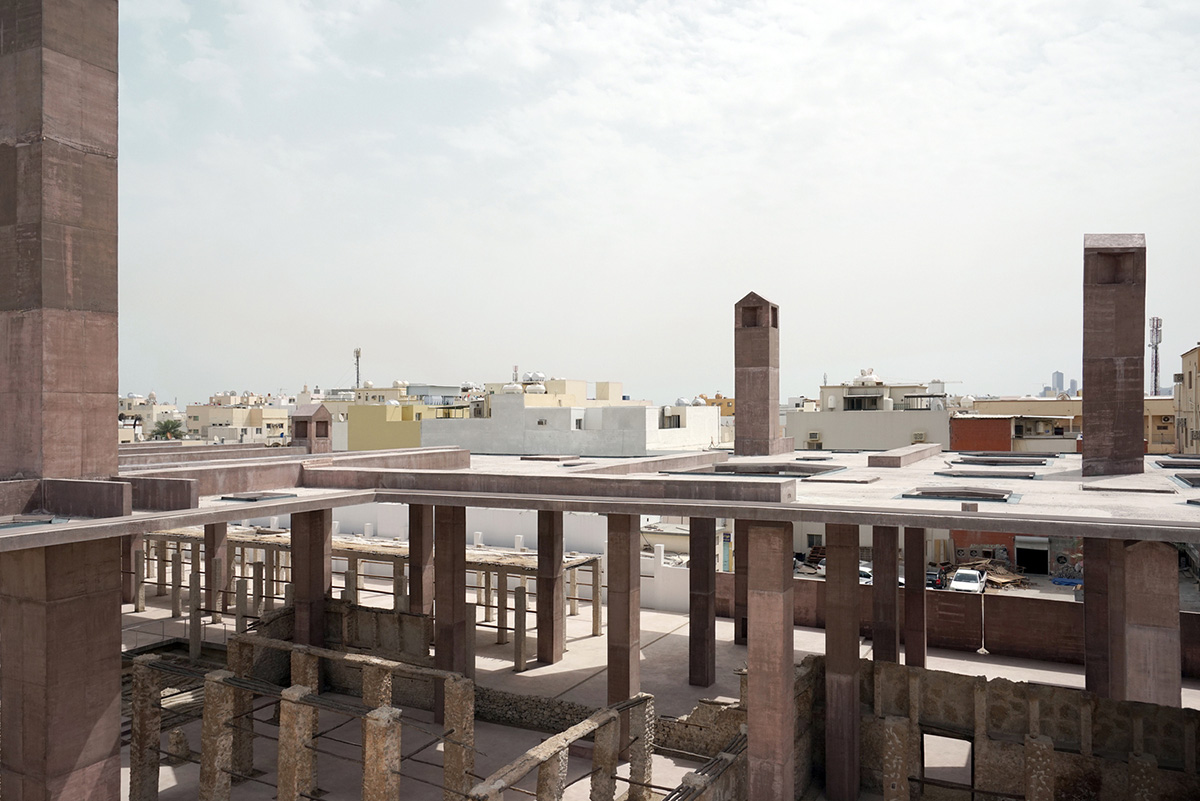 Valerio Olgiati designs monolithic entrance with forest of columns to Pearling Path in Bahrain