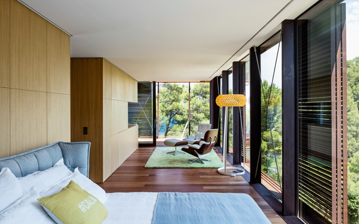 This Is Arquitectura completes corten steel Guest Pavilion in the middle of forest in Spain