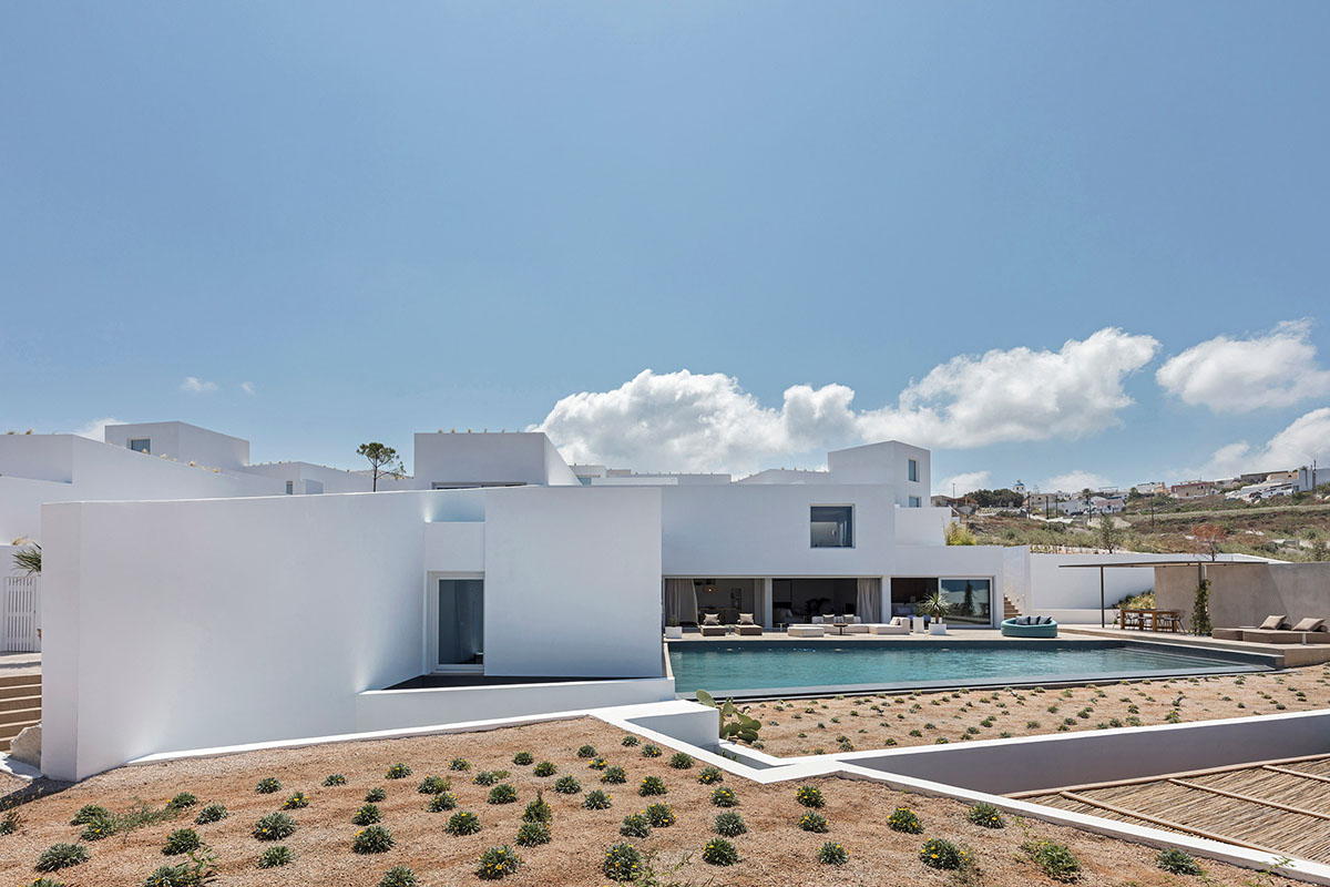 Kapsimalis Architects adds this summer villa featuring orthogonal lines to the Santorini Island