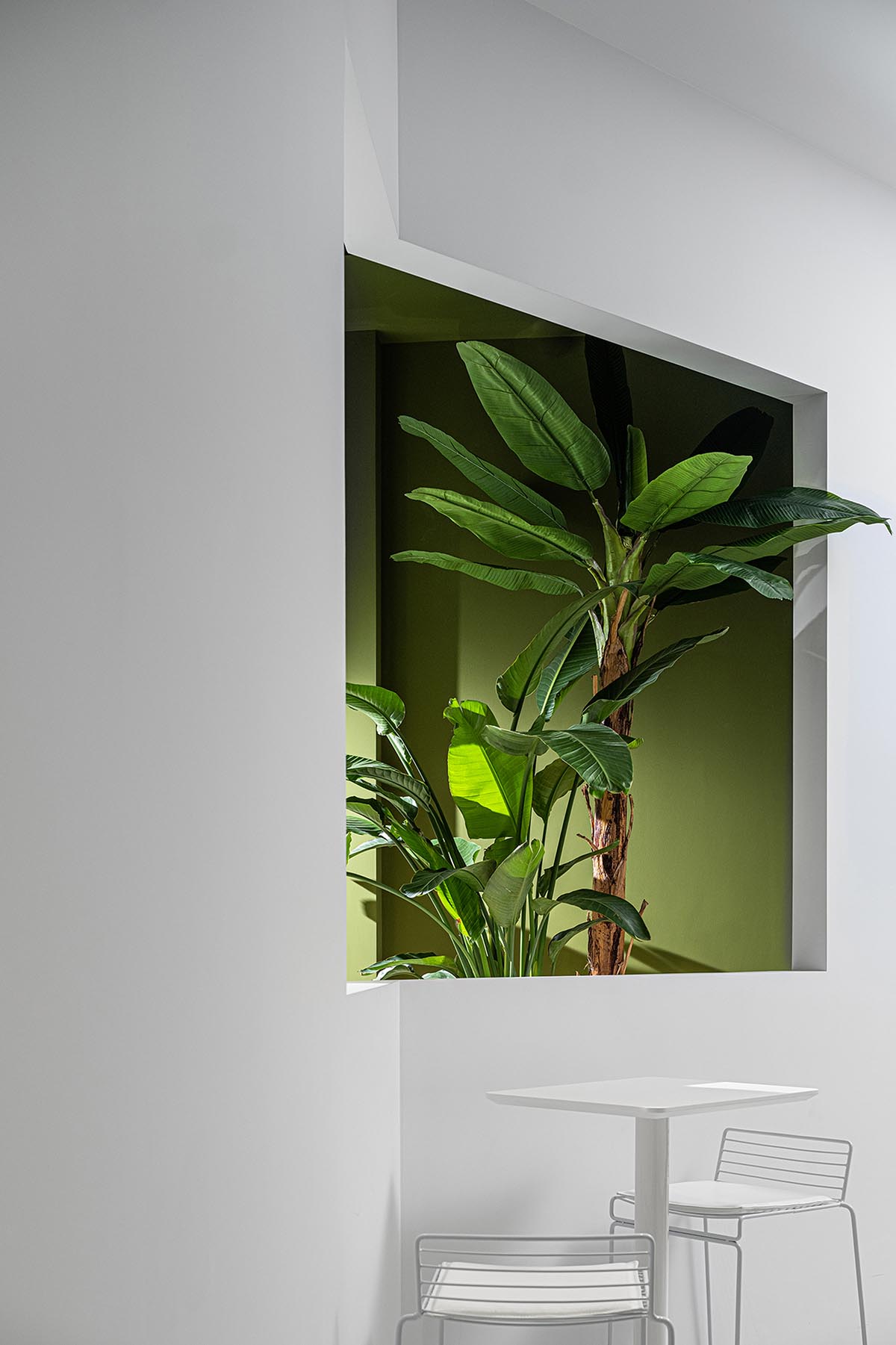 QUCESS Design completes Inno. EcoSLab combining white and green colors to energize interiors