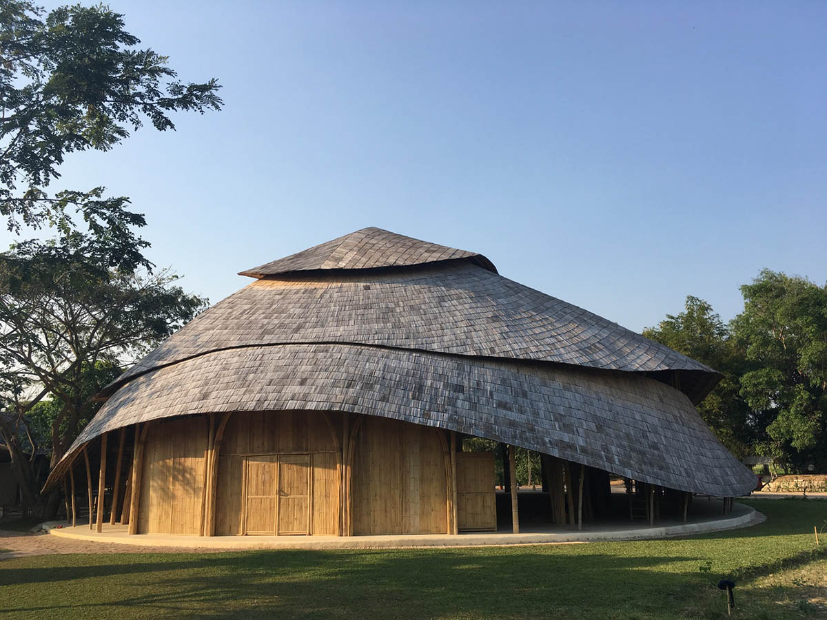 CLA used organic flowing curves with newly invented bamboo trusses for Bamboo Sports Hall in Thailand