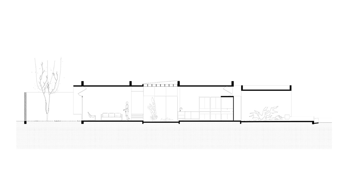 V&atilde;o designed recessed volumes and leaning red wall to offer flexible spaces for this Brazilian house