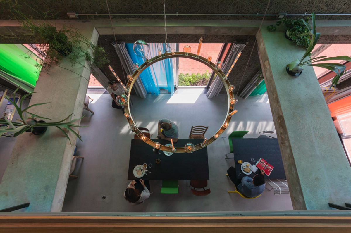 Tato Architects creates painted effect to this concrete hotel by using colourful curtains in Osaka