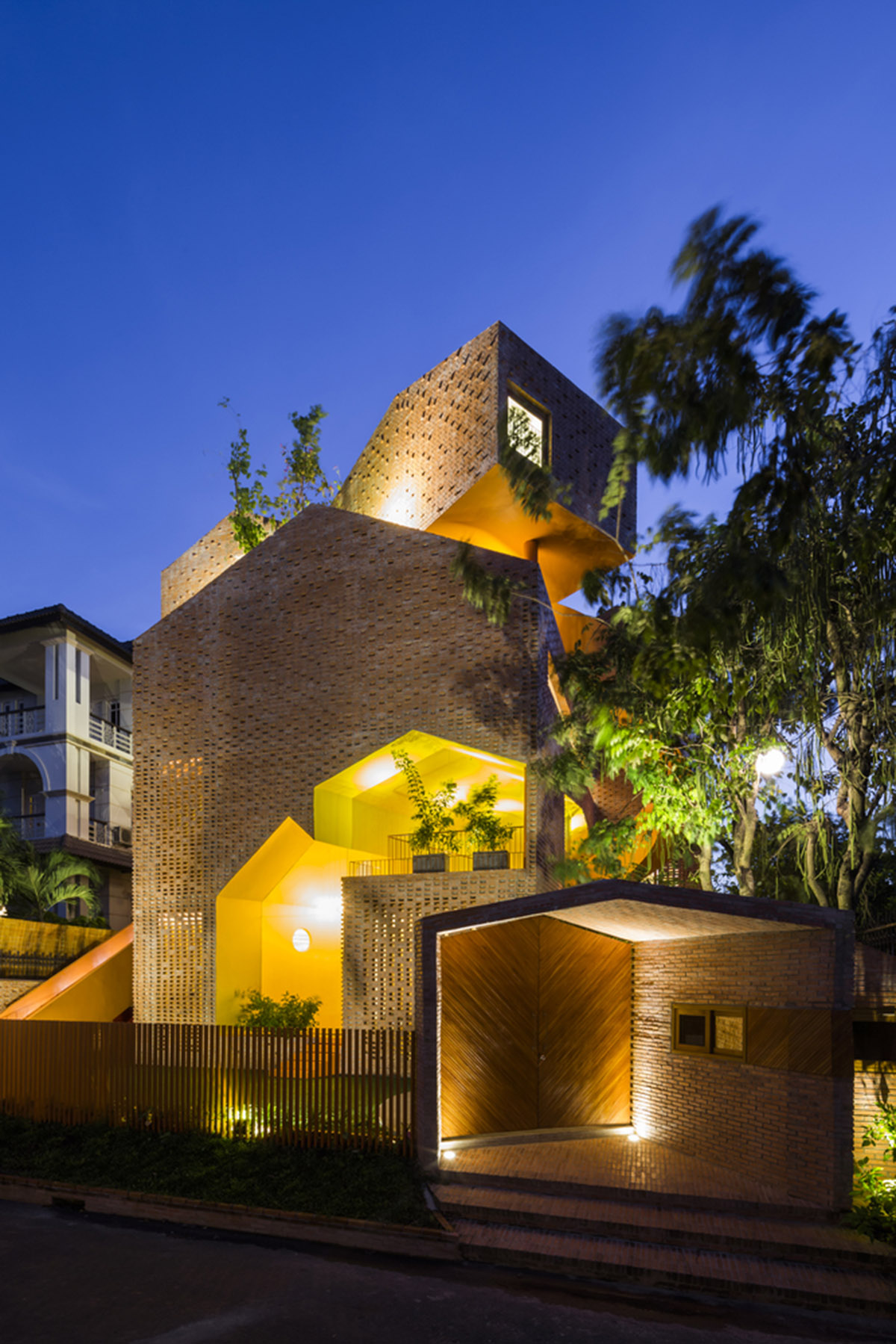 This intertwined kindergarden creates surprising spaces for kids and adults in Vietnam