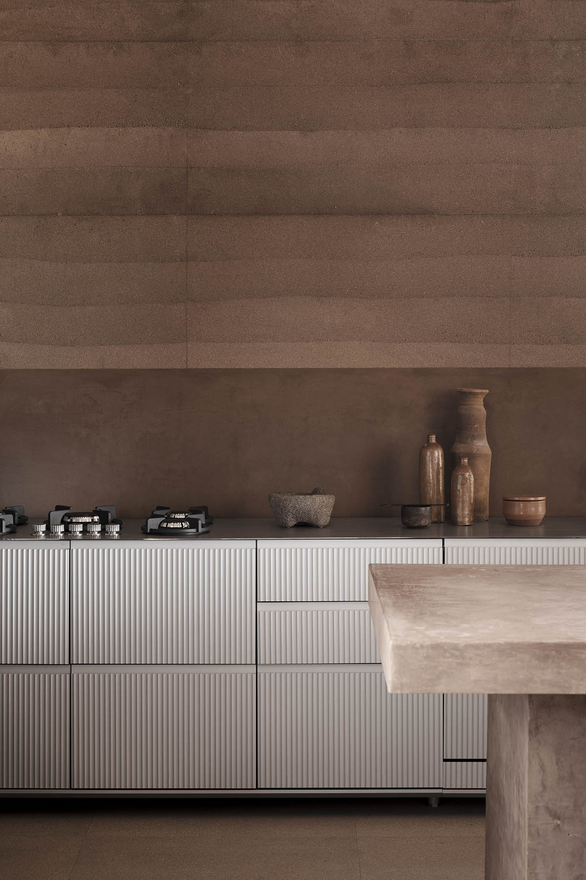 Rammed earth guesthouse by PPAA blends Mexican and Danish influences in Todos Santos