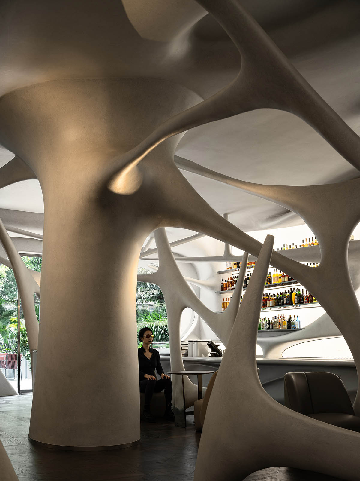 Neuron-like interior by AD ARCHITECTURE combines purity and complexity for cafe and bar in Shenzhen