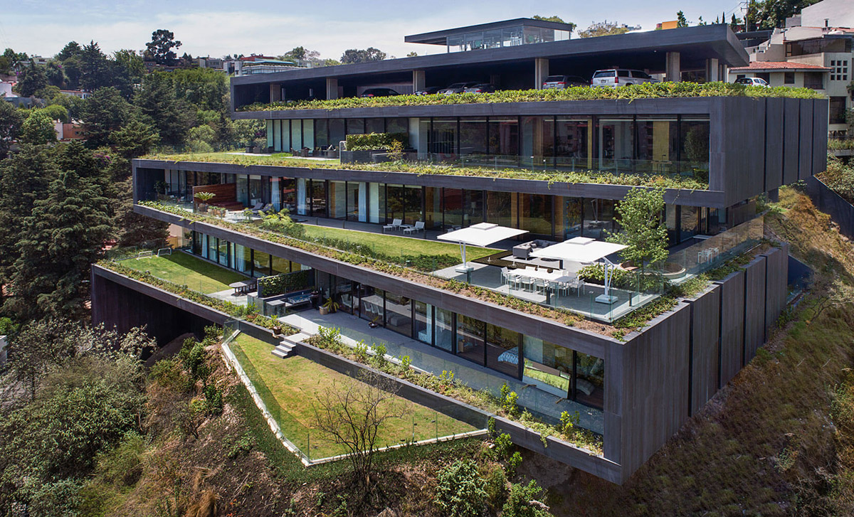 Sordo Madaleno Arquitectos' folded house perfectly sits on rugged topography of Mexico City