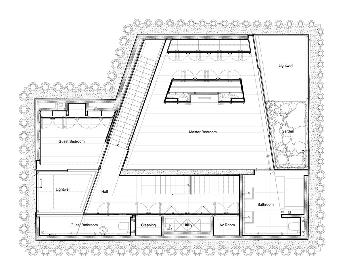 Gianni Botsford Architects transforms dilapidated bungalow with a giant copper clad roof in London