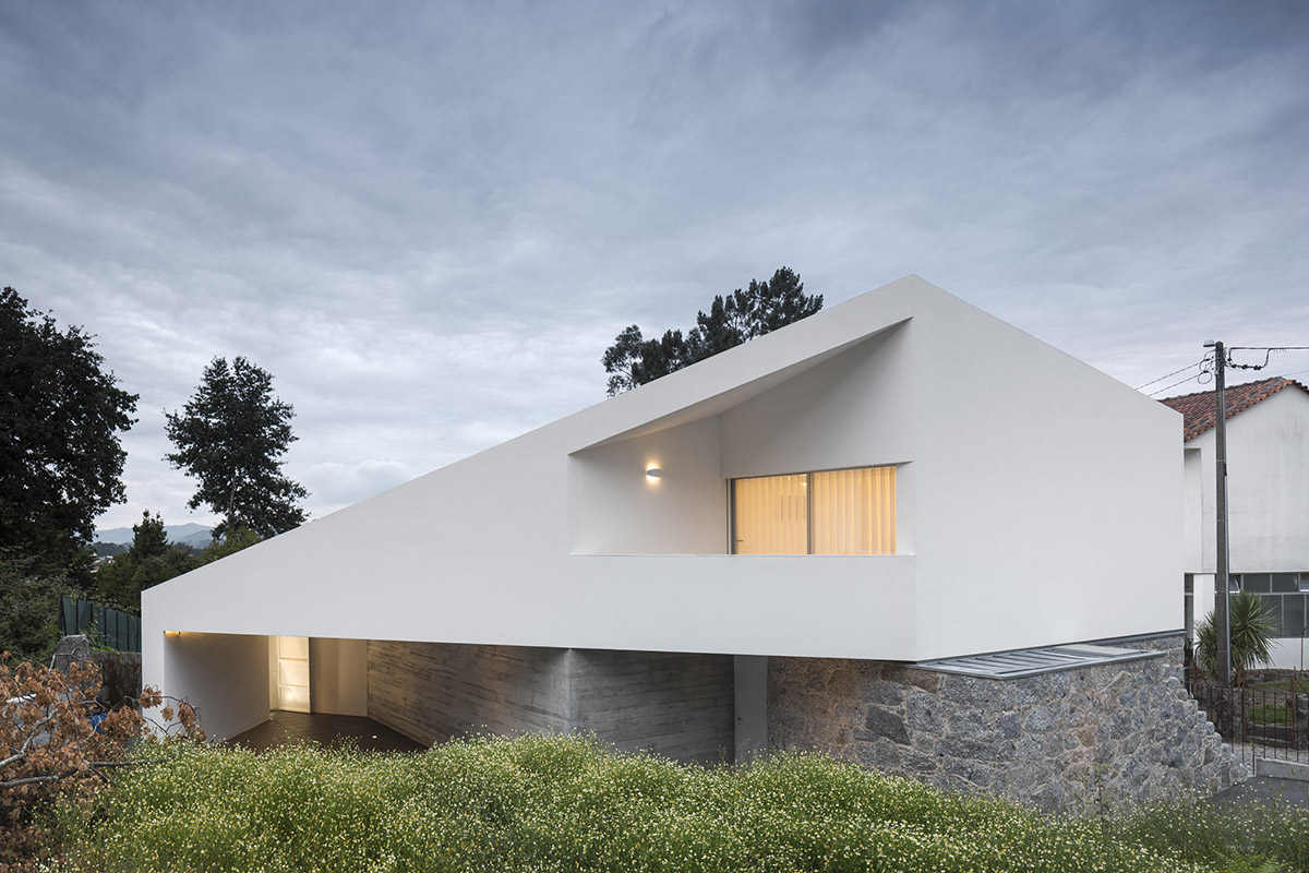 Rui Vieira Oliveira Built Multifaceted House placed atop Ancient Grape Mill In Portugal's village