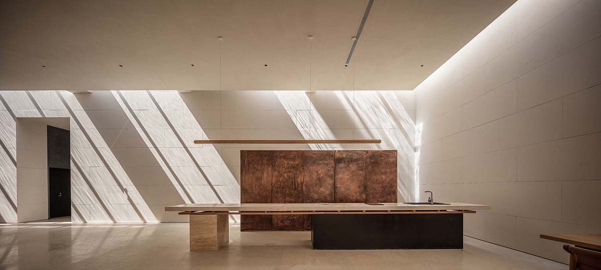 Waterfrom Design creates peaceful interior with wooden furnitures for tea community center in China