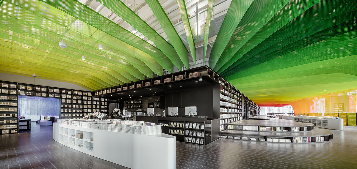 Wutopia Lab completes Zhongshu Bookstore in China with undulating metal panels