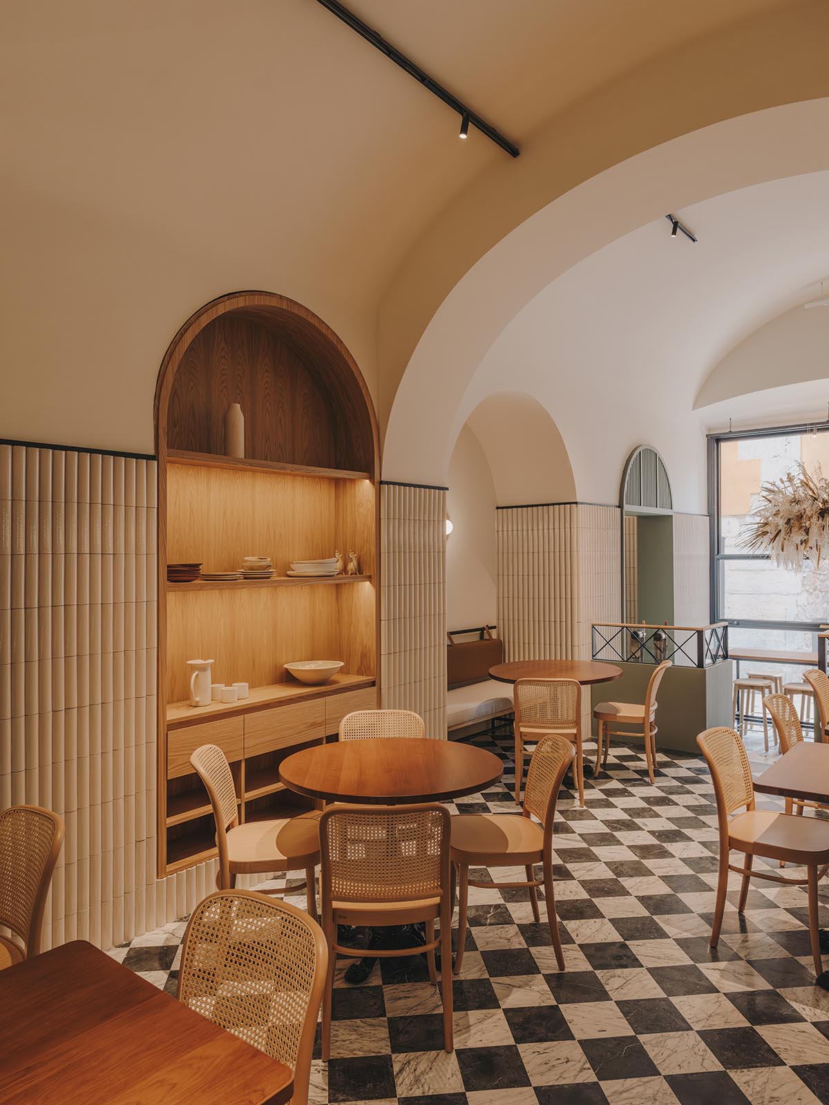 El Equipo Creativo converts 18th-century palace into hotel with rich textures and colors in Girona