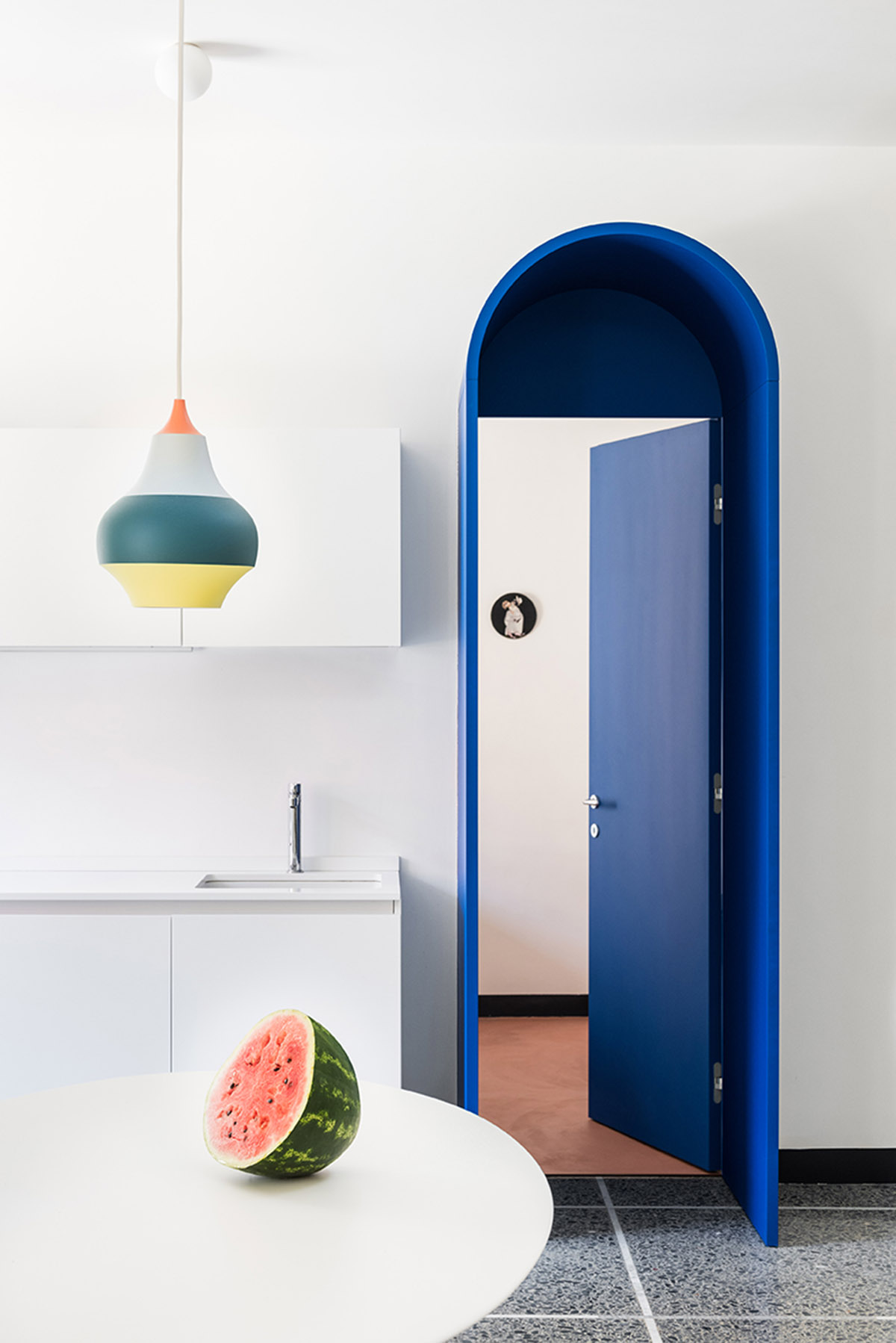 La Macchina Studio revives old apartment with theatrical and colorful interiors in Rome