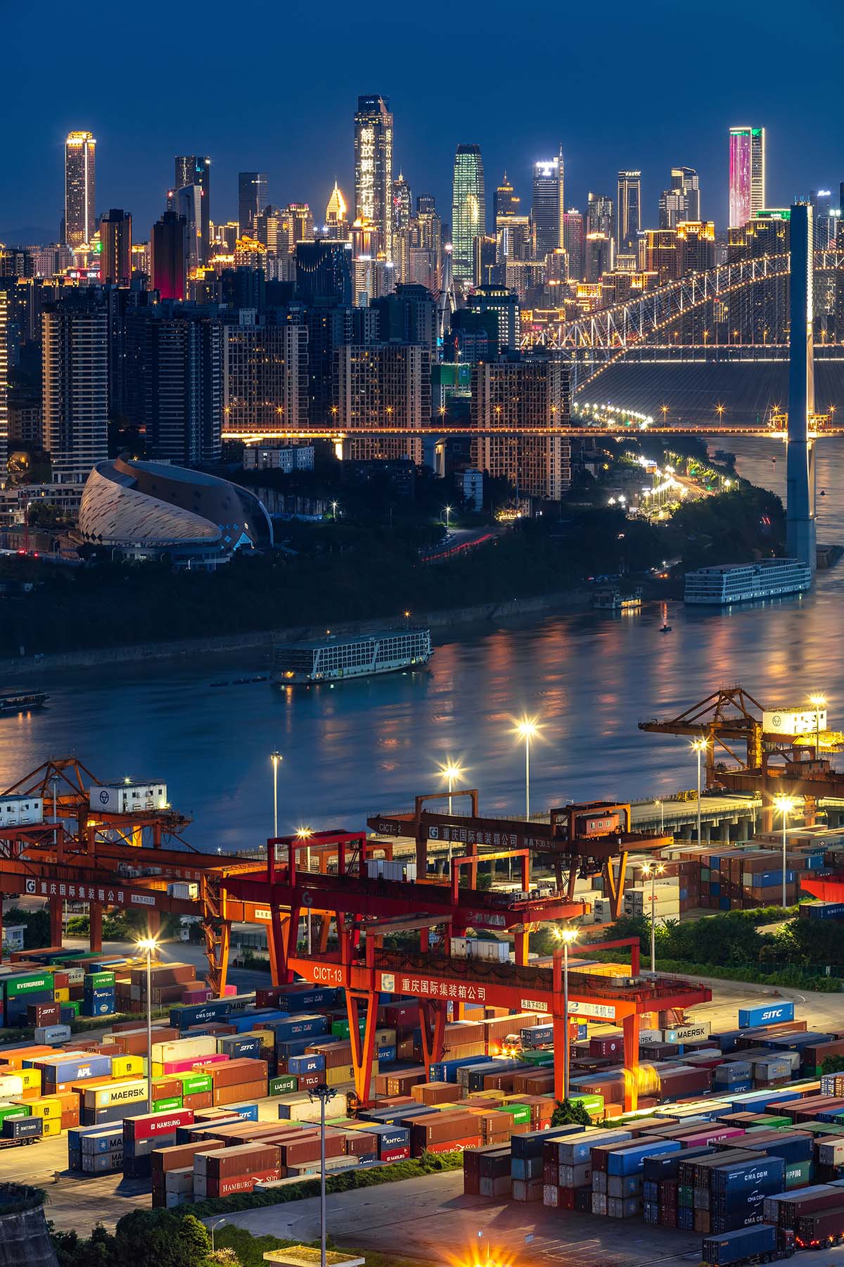 MAD designs futuristic walking city for cruise centre with elevated gantry crane-looking buildings 