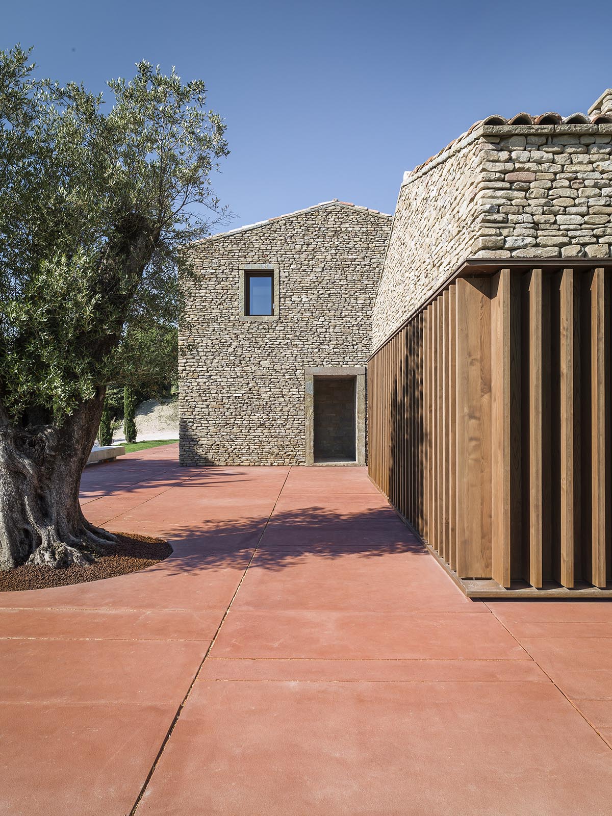 GGA&rsquo;s AP House elegantly harmonised with their stone shell within the historic landscape of Marche