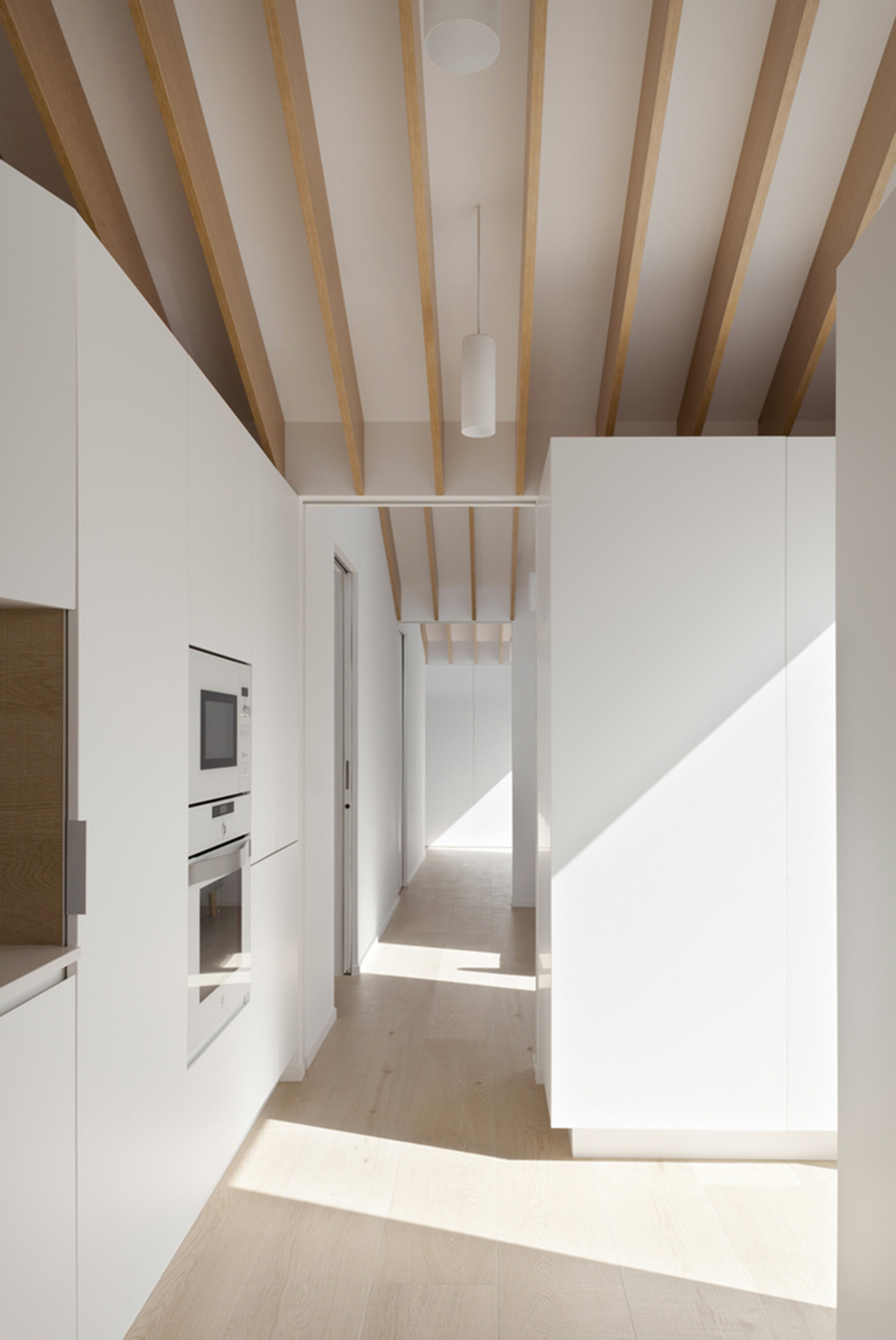 Pablo Muñoz Payá Arquitectos renovates former house with wooden shutters in Spain