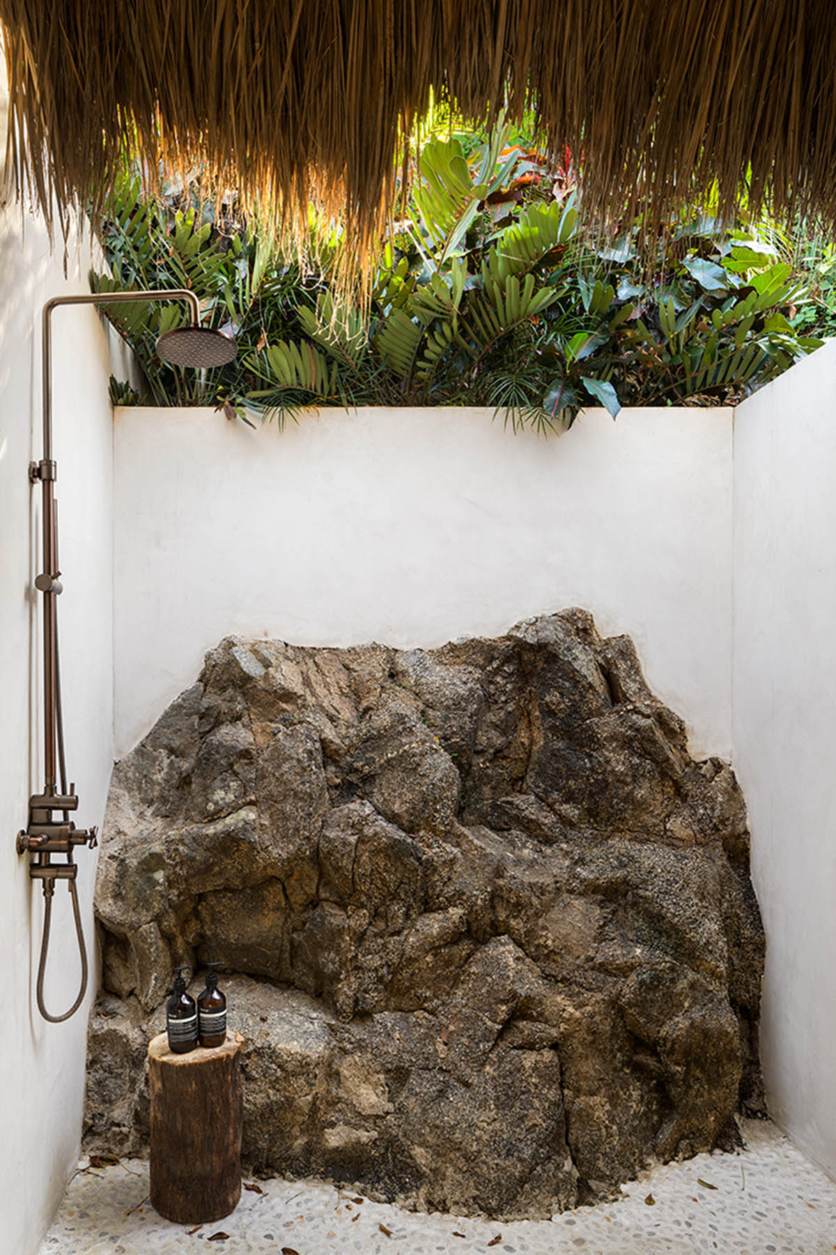 MAIN OFFICE adds half-circle yoga platform to thatched-roof guest villas in Sayulita, Mexico